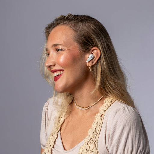 Model wearing JLab GO Pods ANC true wireless earbuds