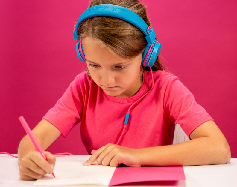 Child wearing JBuddies Studio kids headphones