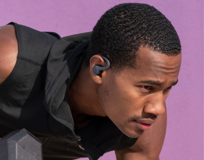 Athlete training with JLab sport earbuds